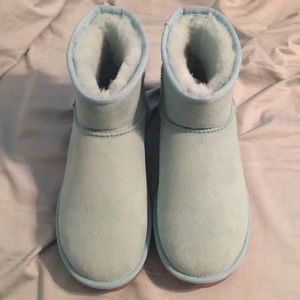 Light blue short UGG boots.